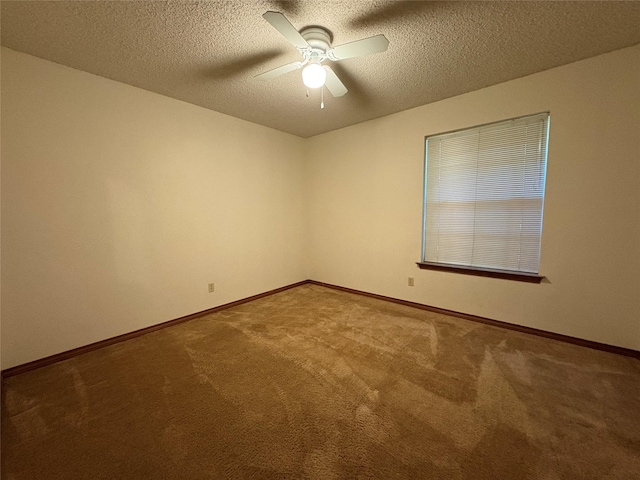327 Shadowwood Trl, Ovilla, TX 75154 - carpeted empty room with ceiling fan, a textured ceiling, and baseboards