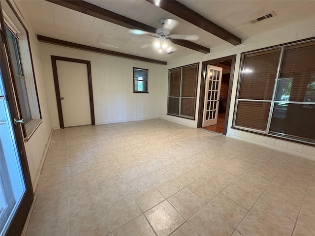 327 Shadowwood Trl, Ovilla, TX 75154 - spare room with beam ceiling, ceiling fan, and light tile patterned flooring