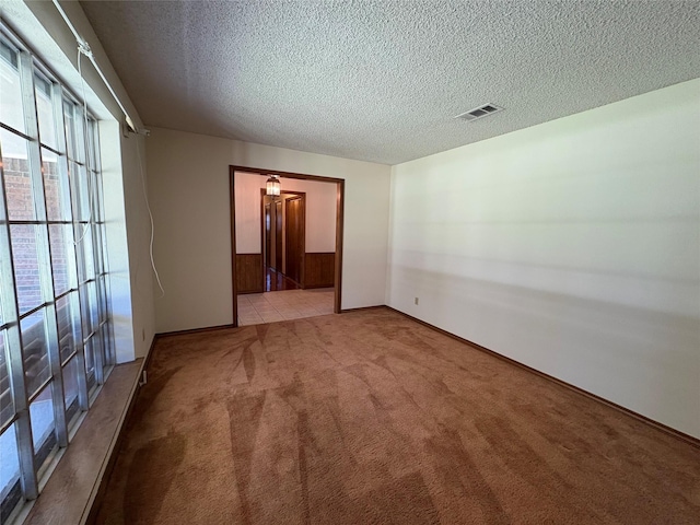 327 Shadowwood Trl, Ovilla, TX 75154 - carpeted spare room featuring a textured ceiling and baseboards