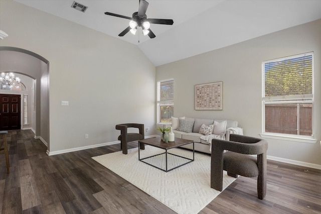 2608 Dunbar Dr, Mckinney, TX 75072 - living room featuring arched walkways, a ceiling fan, baseboards, wood finished floors, and high vaulted ceiling