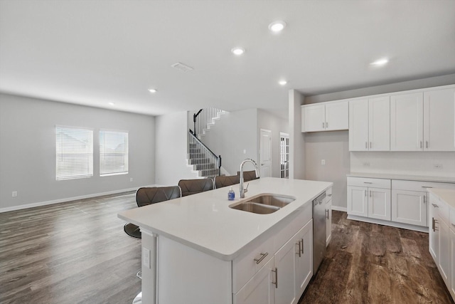 6112 Fire Water Dr, Fort Worth, TX 76179 - kitchen with a sink, dishwasher, open floor plan, dark wood finished floors, and light countertops
