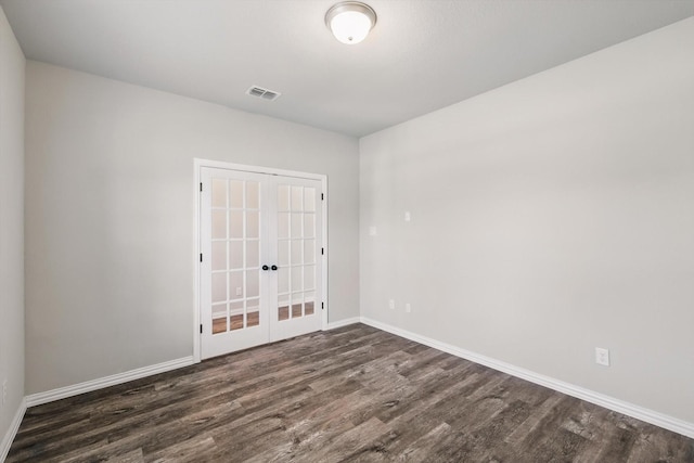 6112 Fire Water Dr, Fort Worth, TX 76179 - unfurnished room featuring french doors, dark wood-style flooring, and baseboards