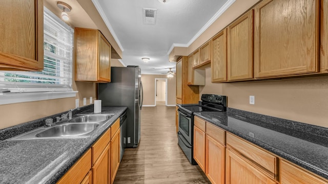 7521 S College Cir, North Richland Hills, TX 76180 - kitchen featuring range with electric cooktop, a sink, wood finished floors, stainless steel dishwasher, and ornamental molding
