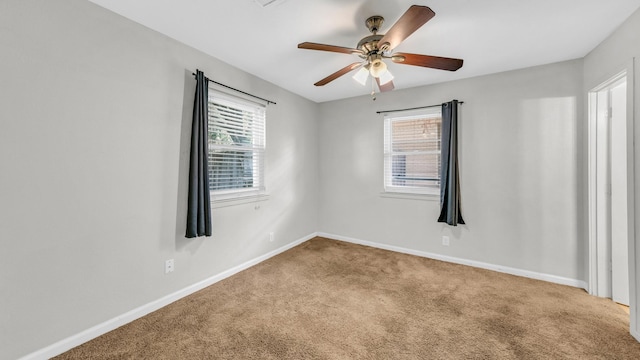 7521 S College Cir, North Richland Hills, TX 76180 - carpeted spare room featuring a ceiling fan and baseboards