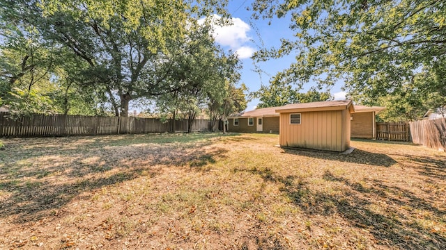 7521 S College Cir, North Richland Hills, TX 76180 - view of yard featuring an outdoor structure