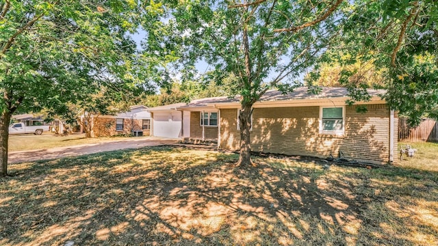 7521 S College Cir, North Richland Hills, TX 76180 - ranch-style house featuring driveway, a garage, and brick siding