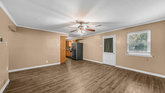 7521 S College Cir, North Richland Hills, TX 76180 - unfurnished living room with a ceiling fan, dark wood-style floors, ornamental molding, and baseboards