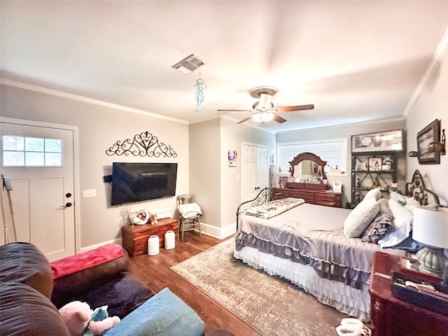 812 Walters St, Frankston, TX 75763 - bedroom featuring ornamental molding, wood finished floors, baseboards, and a ceiling fan