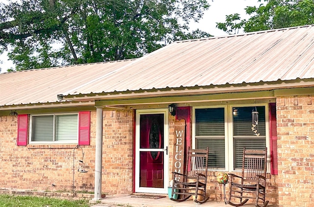 812 Walters St, Frankston, TX 75763 - view of front of property featuring brick siding and metal roof