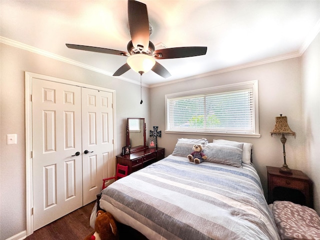 812 Walters St, Frankston, TX 75763 - bedroom with crown molding, dark wood-type flooring, a closet, ceiling fan, and baseboards