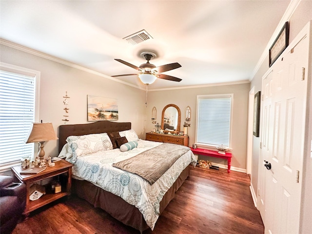 812 Walters St, Frankston, TX 75763 - bedroom featuring a closet, dark wood-style floors, baseboards, crown molding, and a ceiling fan