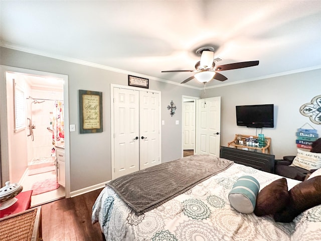 812 Walters St, Frankston, TX 75763 - bedroom with dark wood-style flooring, ornamental molding, a closet, ceiling fan, and baseboards