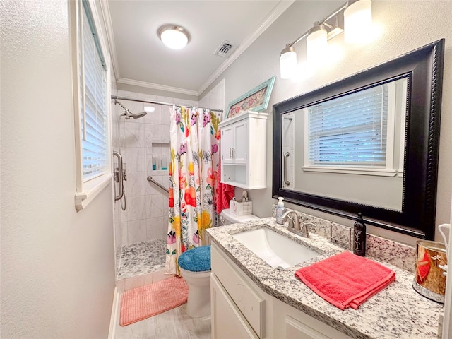 812 Walters St, Frankston, TX 75763 - bathroom featuring healthy amount of natural light, a tile shower, ornamental molding, toilet, and vanity