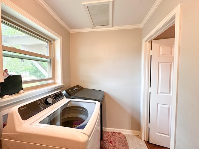 812 Walters St, Frankston, TX 75763 - washroom featuring washer and dryer, ornamental molding, baseboards, and attic access