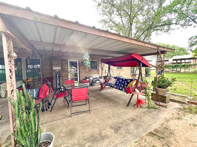 812 Walters St, Frankston, TX 75763 - view of patio featuring a carport