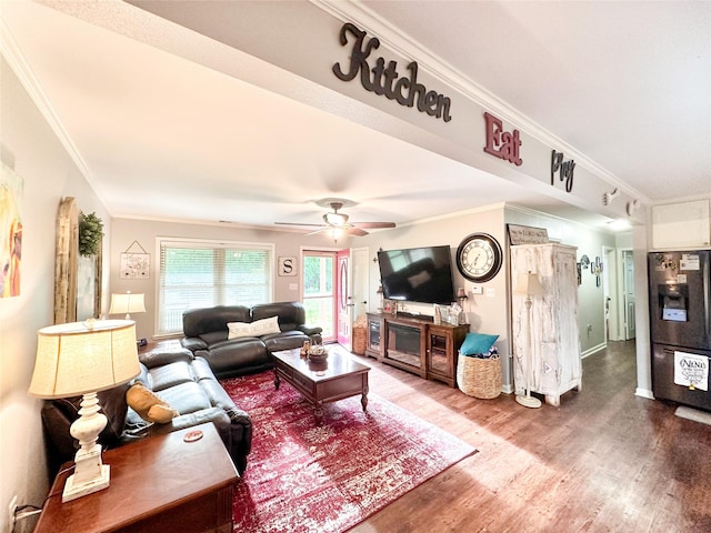 812 Walters St, Frankston, TX 75763 - living room featuring ornamental molding, wood finished floors, ceiling fan, and baseboards