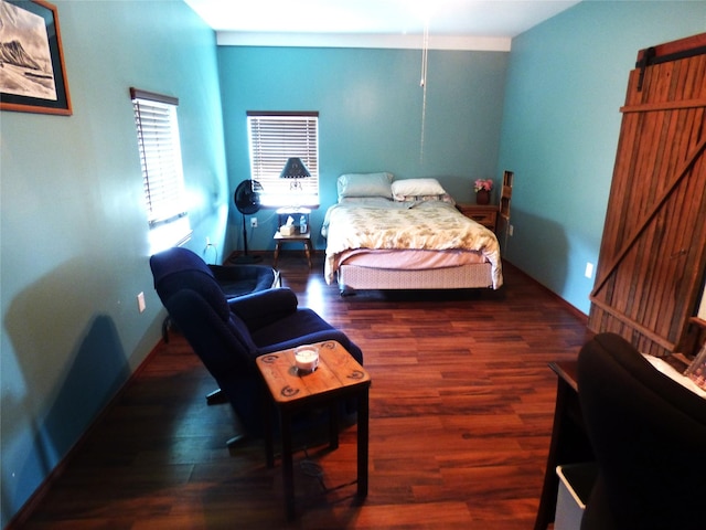 1075 County Road 436, Eastland, TX 76448 - bedroom featuring wood finished floors and baseboards