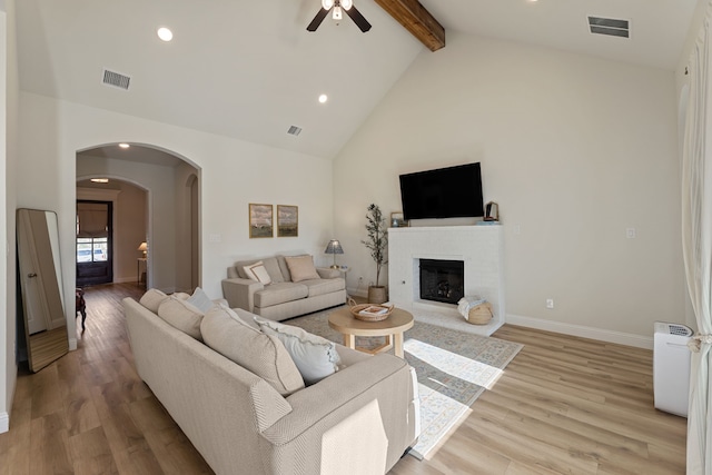 233 Observation Dr N, Aledo, TX 76008 - living area with beam ceiling, arched walkways, a ceiling fan, high vaulted ceiling, and recessed lighting