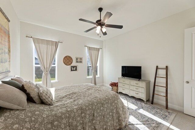 233 Observation Dr N, Aledo, TX 76008 - bedroom with light colored carpet, baseboards, and a ceiling fan