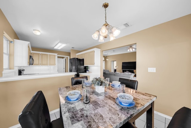 318 Cecile Ct, Arlington, TX 76013 - dining room with baseboards, tile patterned floors, and ceiling fan