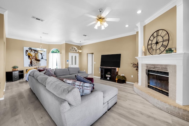 318 Cecile Ct, Arlington, TX 76013 - living room featuring crown molding, a fireplace, wood finished floors, a ceiling fan, and baseboards