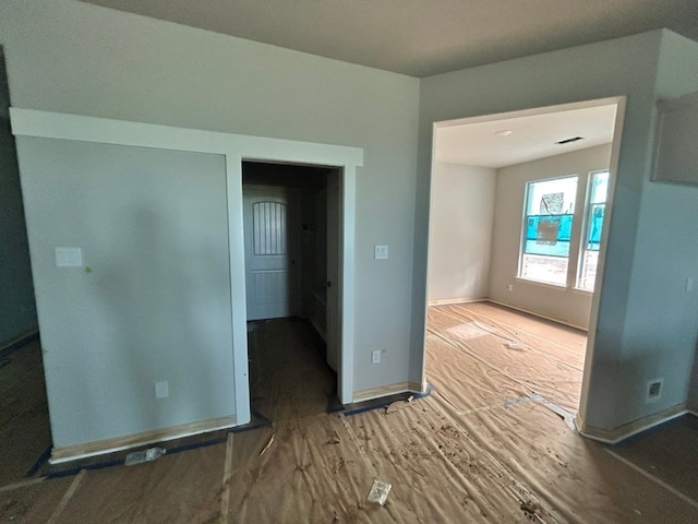 3514 Columbus St, Gainesville, TX 76240 - unfurnished room featuring wood finished floors and baseboards