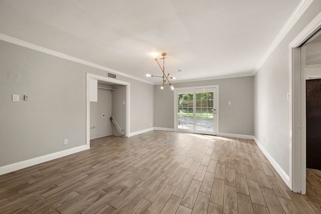 6455 Waverly Way, Fort Worth, TX 76116 - spare room featuring wood finished floors, a chandelier, ornamental molding, and baseboards