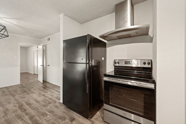 6455 Waverly Way, Fort Worth, TX 76116 - kitchen featuring stainless steel range with electric stovetop, wall chimney exhaust hood, freestanding refrigerator, a textured ceiling, and light wood-style flooring