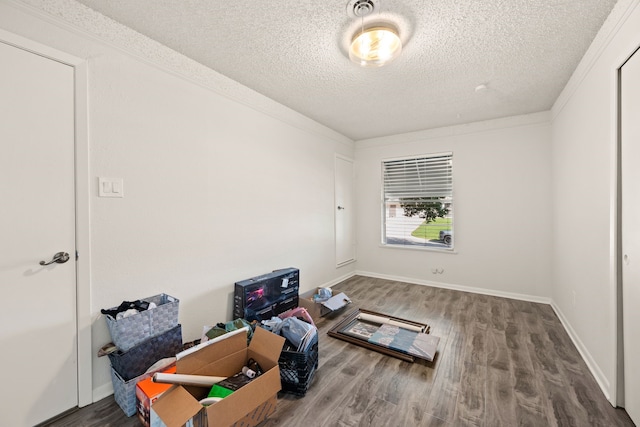 6455 Waverly Way, Fort Worth, TX 76116 - unfurnished room with wood finished floors, a textured ceiling, and baseboards
