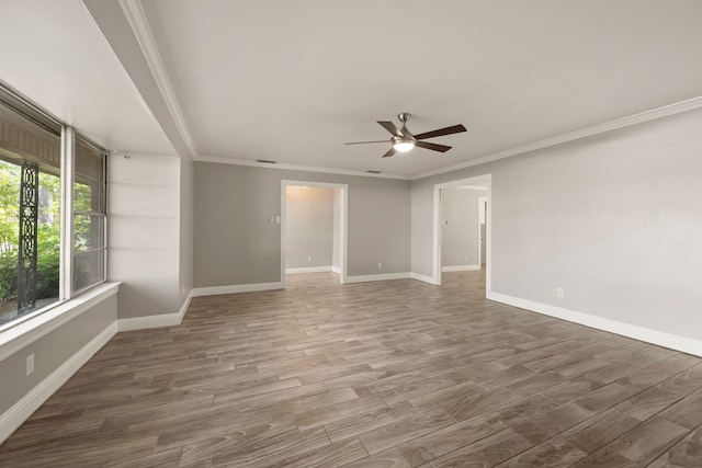 6455 Waverly Way, Fort Worth, TX 76116 - spare room with a ceiling fan, ornamental molding, baseboards, and wood finished floors