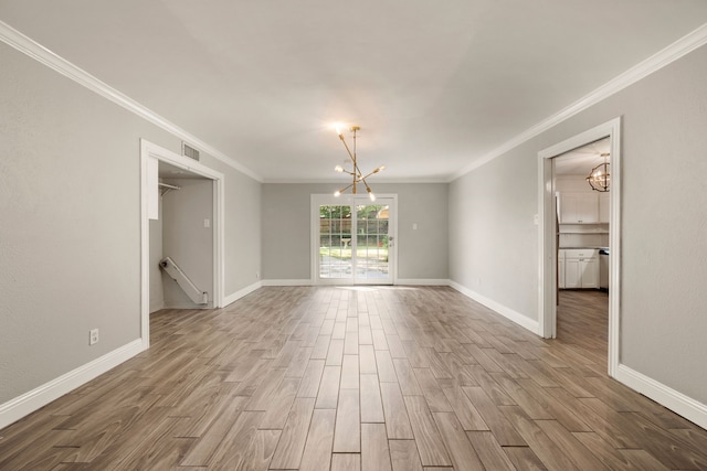 6455 Waverly Way, Fort Worth, TX 76116 - empty room with a chandelier, wood finished floors, baseboards, and crown molding