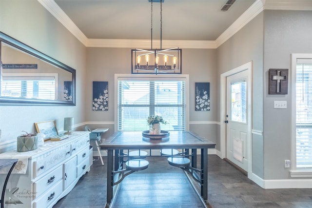 349 Mill Creek Dr, Abilene, TX 79602 - dining space with dark wood-type flooring, baseboards, a chandelier, and crown molding