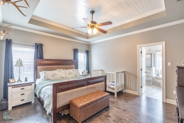 349 Mill Creek Dr, Abilene, TX 79602 - bedroom with a tray ceiling, multiple windows, crown molding, wood-type flooring, and baseboards