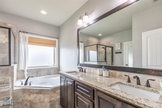 349 Mill Creek Dr, Abilene, TX 79602 - bathroom with a shower stall, a bath, and double vanity
