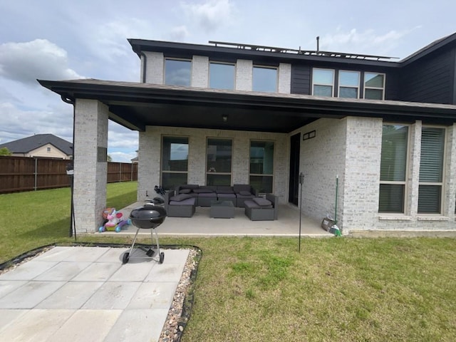 501 Upper Falls Ln, Mansfield, TX 76063 - back of property with a patio, outdoor lounge area, and brick siding