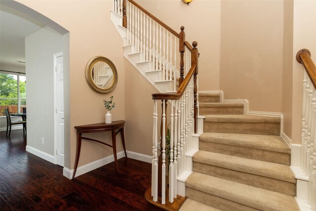 5732 Chelmsford Trl, Arlington, TX 76018 - entrance foyer featuring healthy amount of natural light, wood-type flooring, stairway, and a towering ceiling