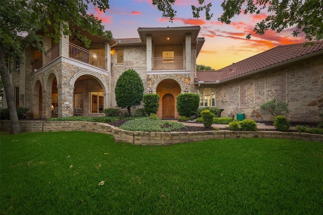 1 Hamper Ct, Trophy Club, TX 76262 - view of front of home with a balcony, a yard, and stone siding