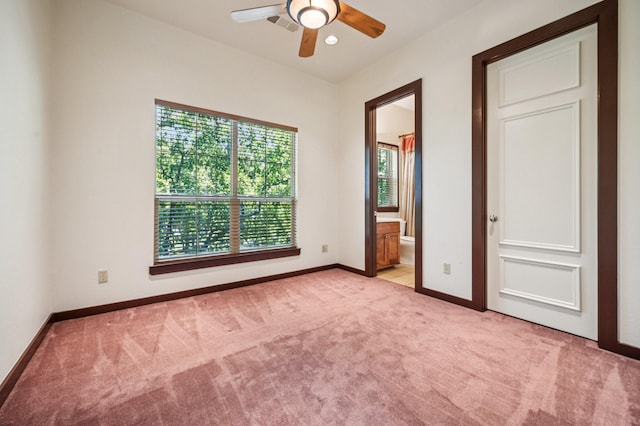 1 Hamper Ct, Trophy Club, TX 76262 - unfurnished bedroom with multiple windows, light colored carpet, and baseboards