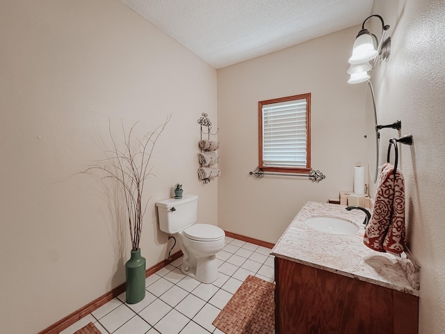 1665 Fm 2452, Corsicana, TX 75110 - half bathroom featuring vanity, toilet, tile patterned floors, baseboards, and a textured ceiling