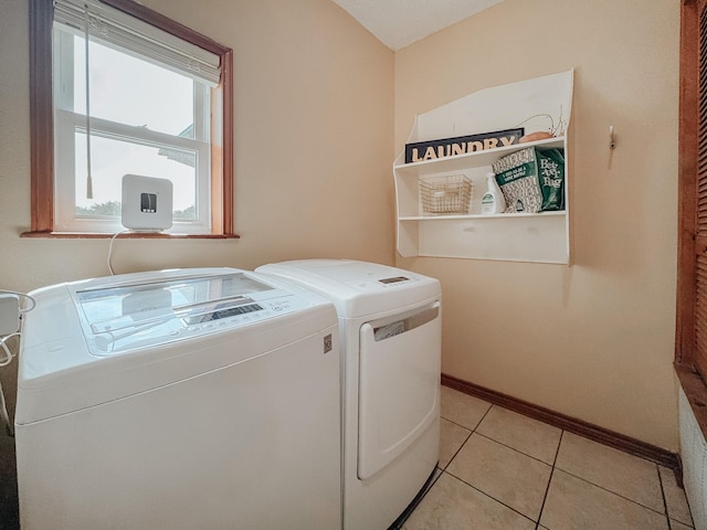 1665 Fm 2452, Corsicana, TX 75110 - washroom featuring independent washer and dryer, baseboards, and light tile patterned flooring