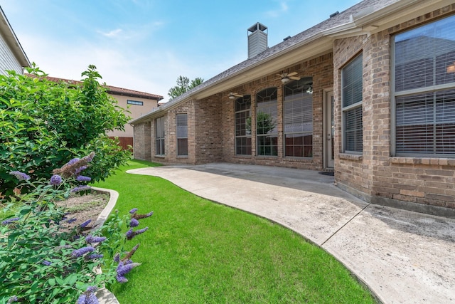 7602 Bridge Water Cir, Frisco, TX 75034 - view of grassy yard with a patio and a ceiling fan