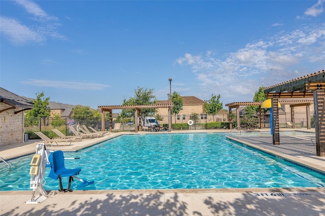 7602 Bridge Water Cir, Frisco, TX 75034 - community pool featuring a pergola and a patio area