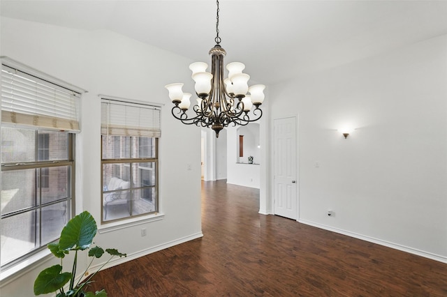7602 Bridge Water Cir, Frisco, TX 75034 - unfurnished room with a chandelier, wood finished floors, baseboards, and healthy amount of natural light