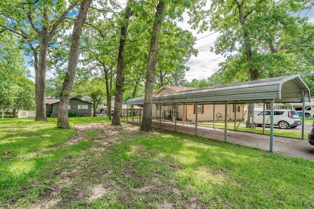 164 Harbor Dr, Gun Barrel City, TX 75156 - view of grassy yard with a detached carport
