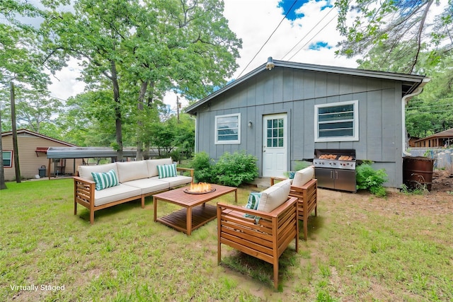 164 Harbor Dr, Gun Barrel City, TX 75156 - back of property featuring an outdoor living space with a fire pit, board and batten siding, and a yard