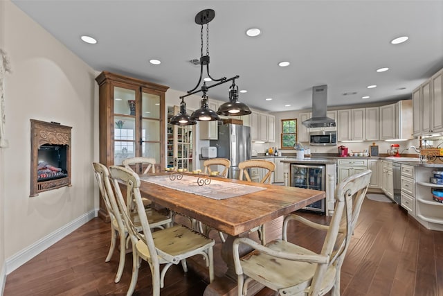 2510 River Ridge Court, Granbury, TX 76048 - dining room featuring beverage cooler, dark wood-style floors, recessed lighting, and baseboards