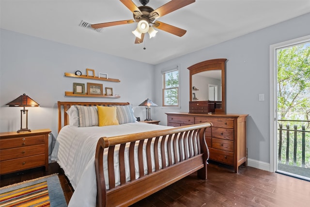 2510 River Ridge Court, Granbury, TX 76048 - bedroom featuring wood finished floors, access to exterior, multiple windows, and baseboards