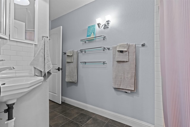 2510 River Ridge Court, Granbury, TX 76048 - bathroom with baseboards and tile patterned floors