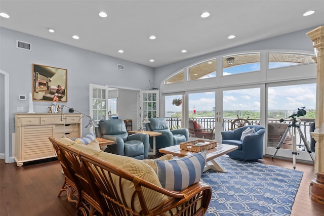 2510 River Ridge Court, Granbury, TX 76048 - living room featuring dark wood-style flooring, recessed lighting, french doors, a towering ceiling, and baseboards