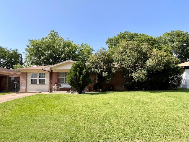 2217 Linwood Ln, Irving, TX 75061 - view of front of property with a front lawn and brick siding